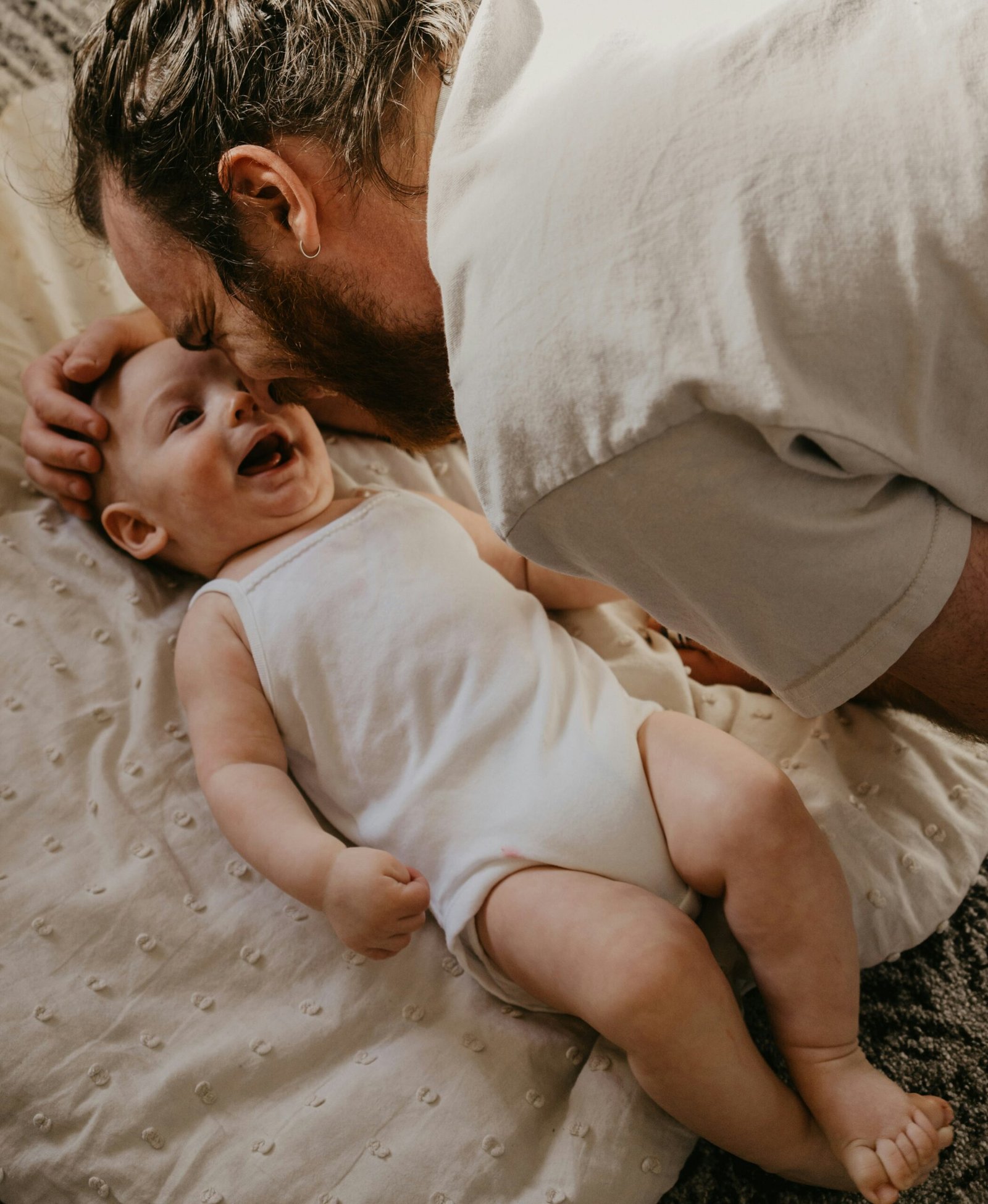 Tender moment between father and child.